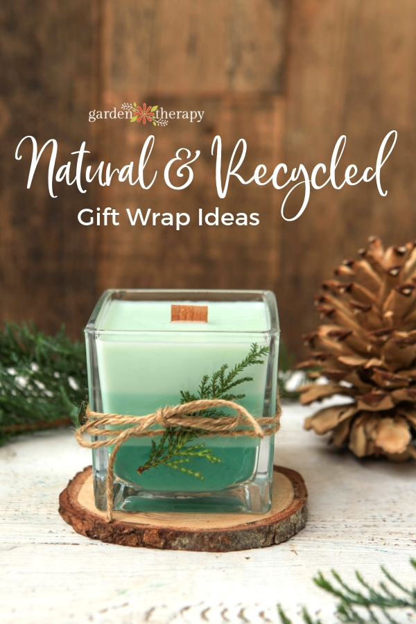 Gifted tri-green colored candle with evergreen decor and twine wrapped around