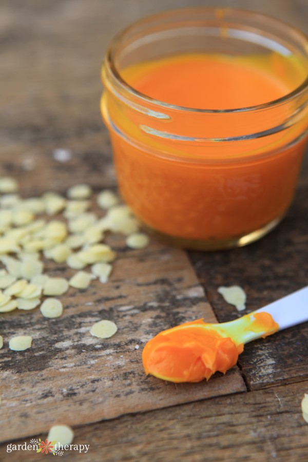 Apply Warming Pain Relief Turmeric and Cayenne Salve with a small spoon