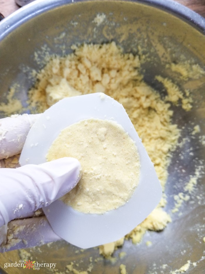 Press the mixture into the mold for Aromatherapy Shower Steamers