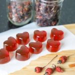 DIY manuka honey lozenges on a wooden top