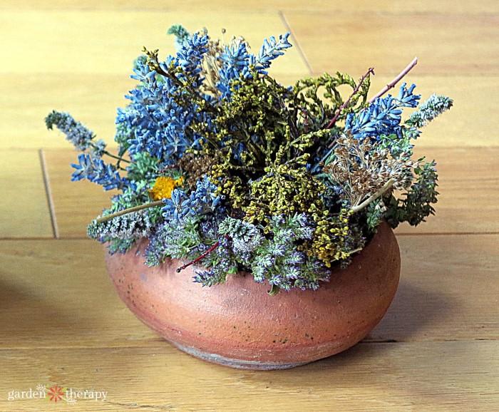 Dried oregano in a copper pot