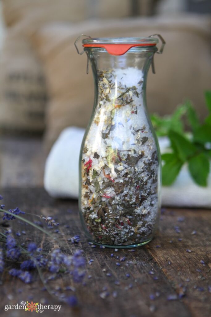 jar full of colloidal oatmeal, epsom salt, and dried botanicals