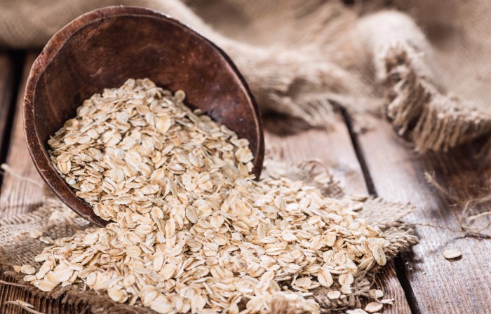 rolled oats spilling out of container