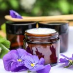 Amber jars filled with homemade lotion