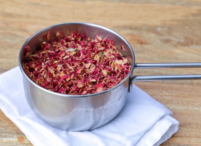 rose water in a pot on a table