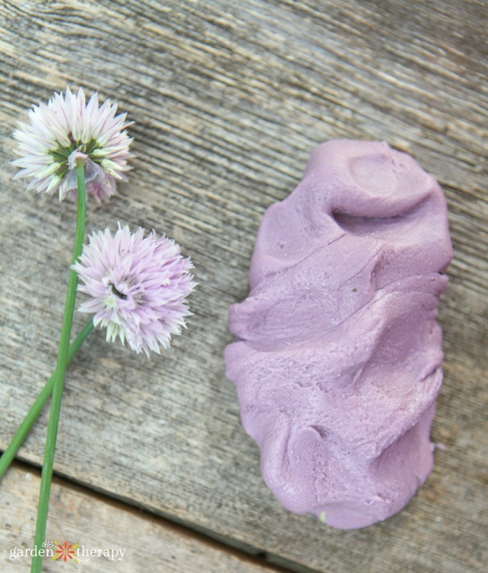 Purple aromatherapy playdough on a wooden background