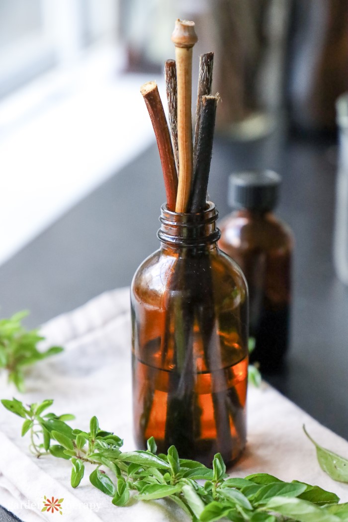 reed diffuser with fresh herbs