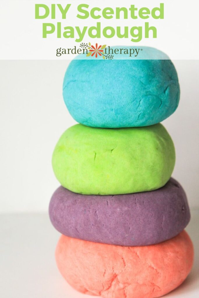 Four DIY scented playdough varieties stacked on top of each other.