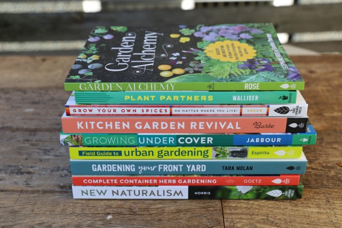 Garden Alchemy and stack of giveaway books