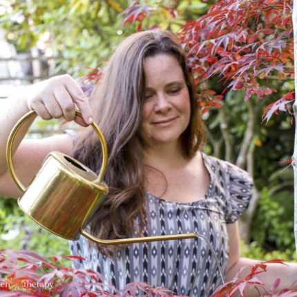 Stephanie with watering can