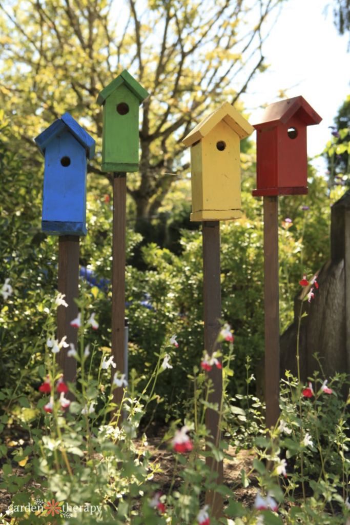 colorful painted bird houses