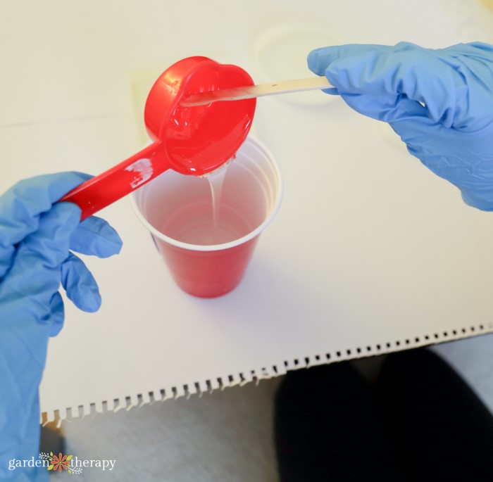 pouring resin into cup