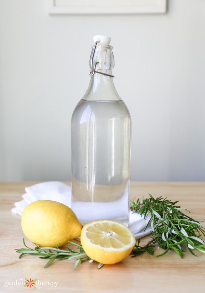 homemade glass cleaner with rosemary and lemon