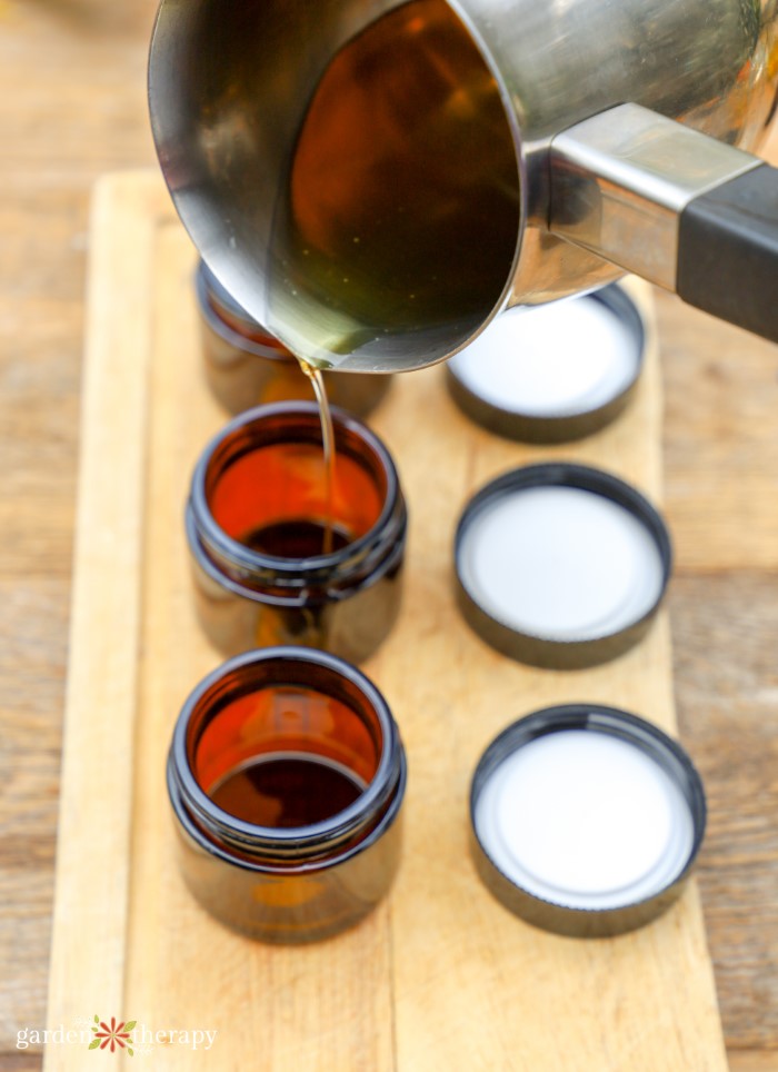pouring salve into containers