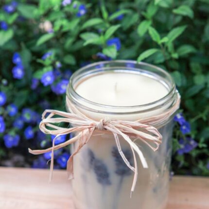 homemade candle with pressed lavender