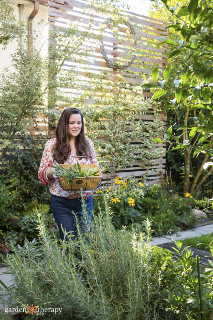 Stephanie in her urban homestead garden