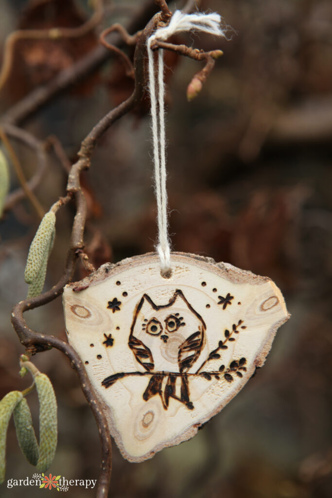 wooden ornament with owl design