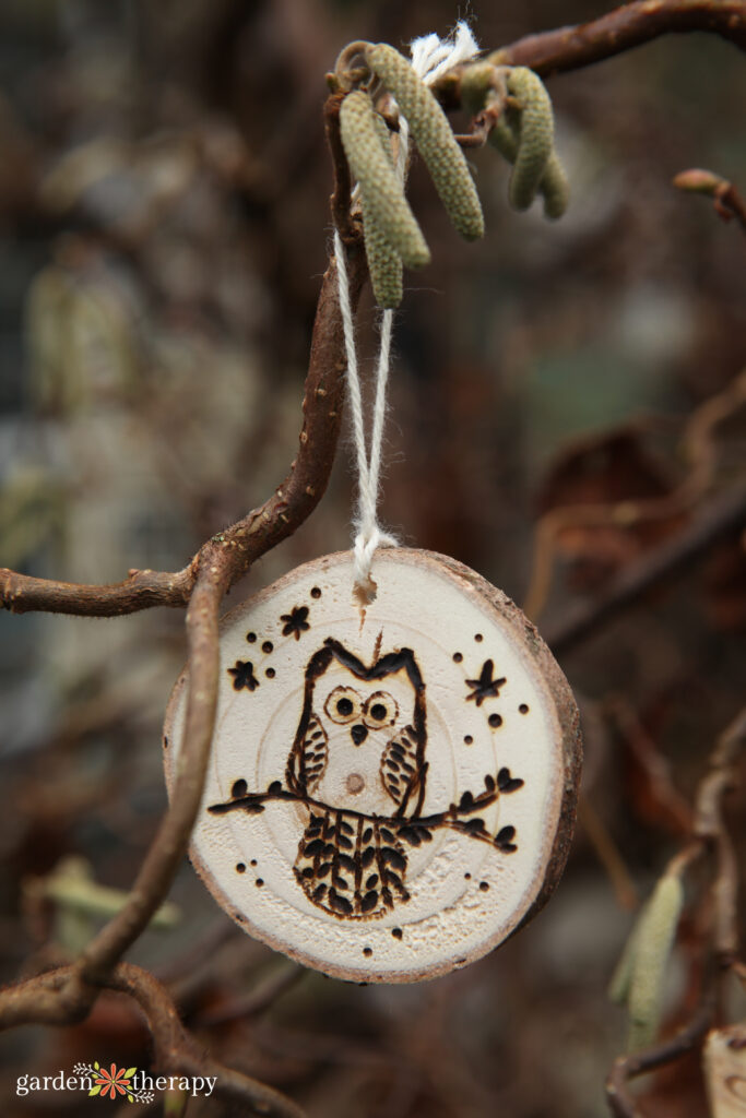 wooden ornament with an owl design