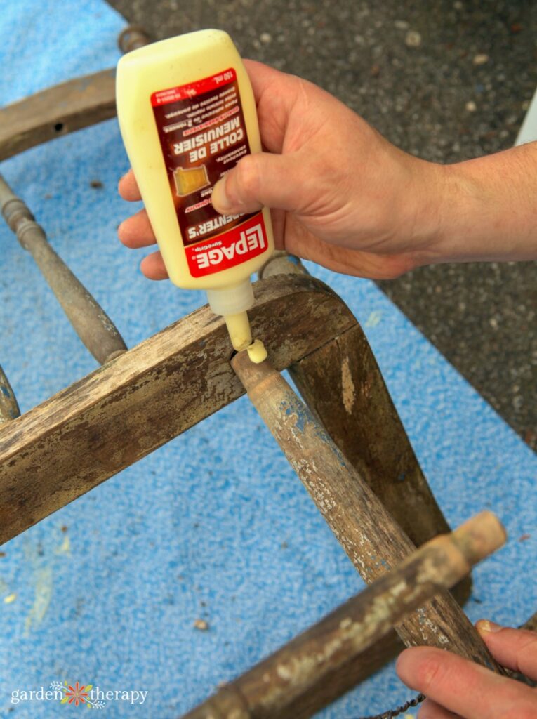 applying wood glue to peony support chair