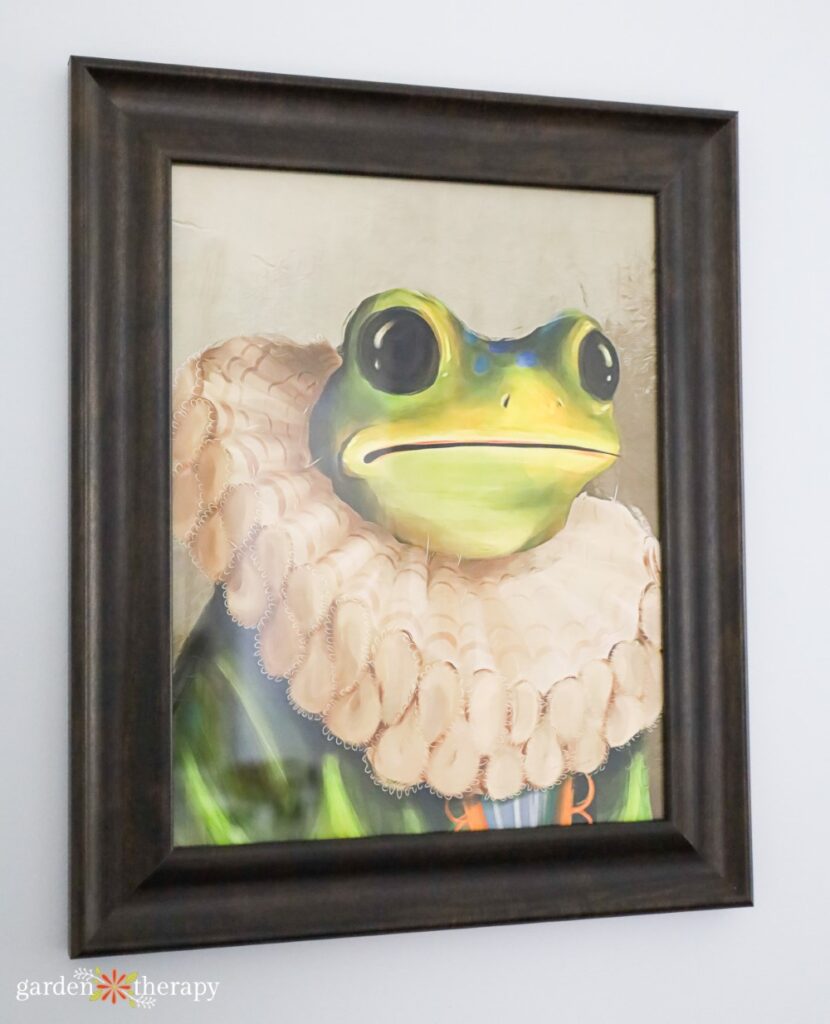 painting of a frog dressed in ruff as apartment decor