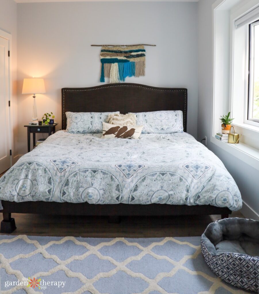 bedroom with blue rug