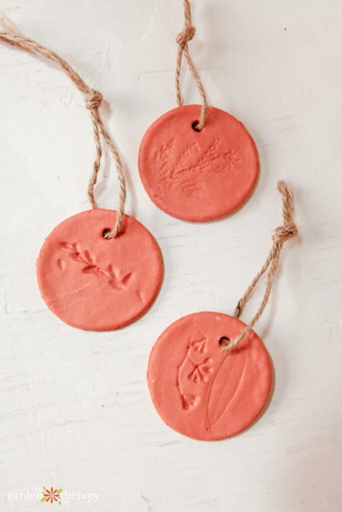 clay DIY gift tags with botanical imprints and twine