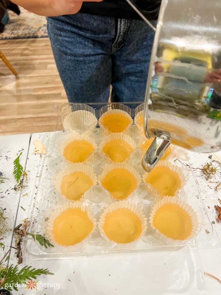 pouring wax into paper muffin liners