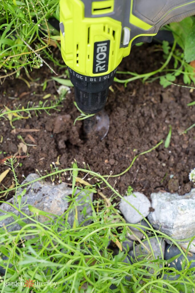 Power planter digging into ground for cutting tulips