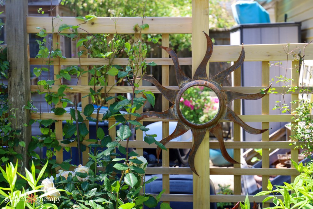 mirror artwork on fence