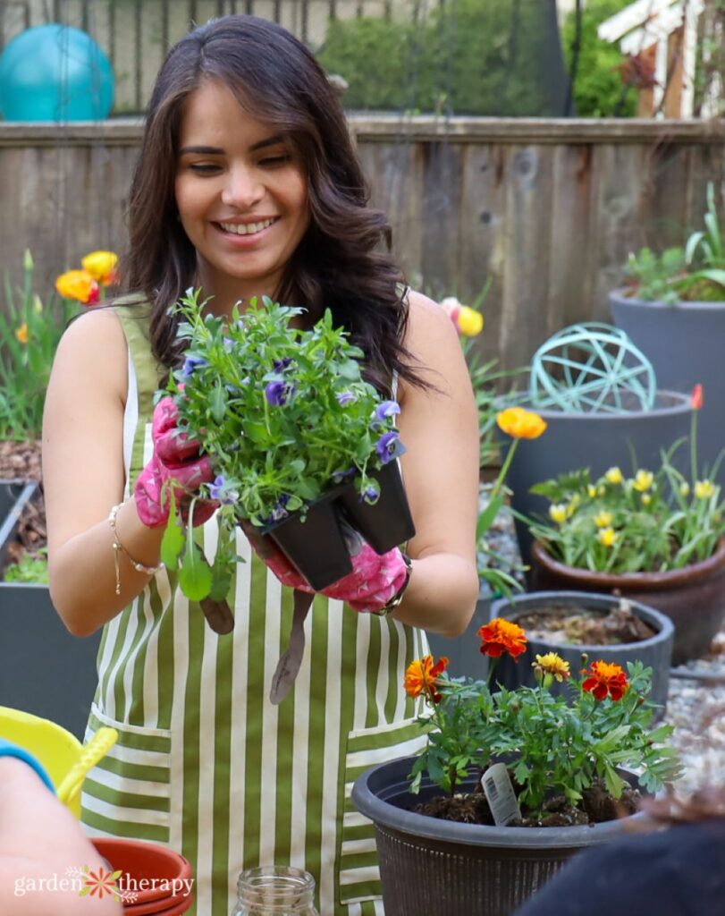 woman planting annuals