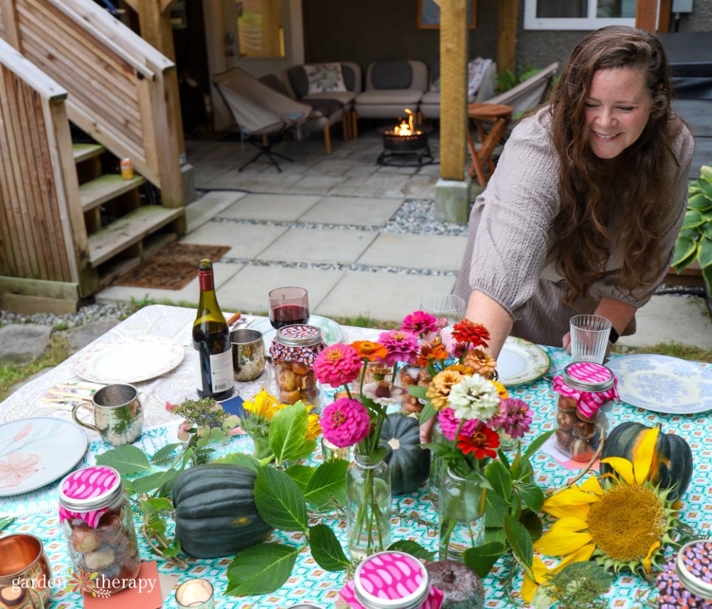 Stephanie at pouring wine at Friendsgiving