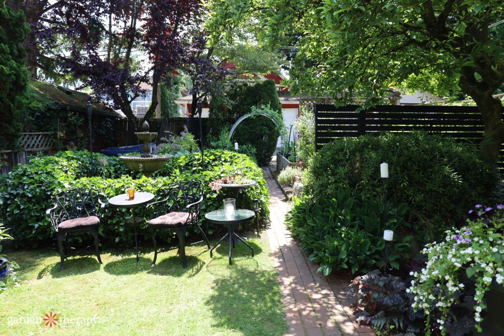 small patio table on a garden lawn