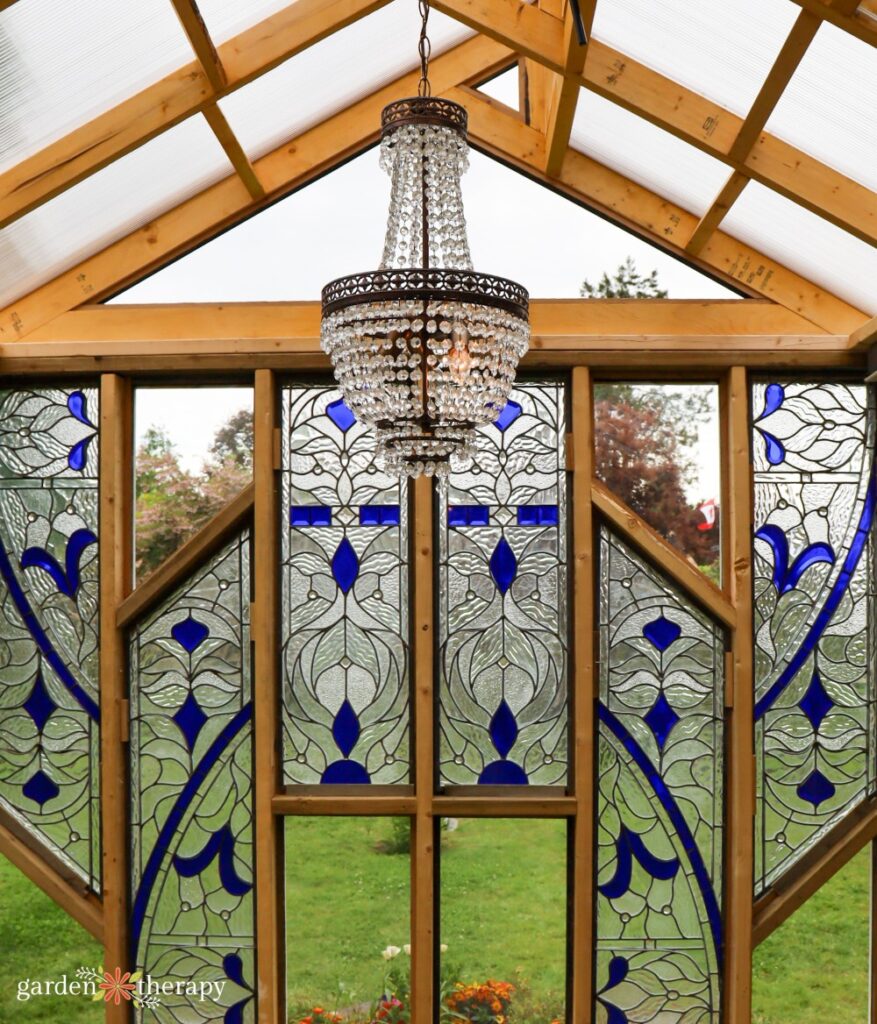 chandelier in stained glass greenhouse