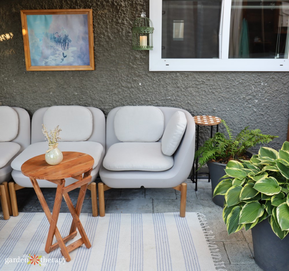 outdoor patio with sectional and rug